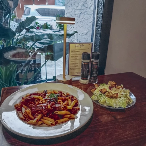 Pasta dish and salad at Ferrucci Ristorante in Downtown Panama City